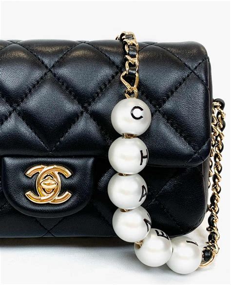 chanel pearls bag|chanel bag with pearl chain.